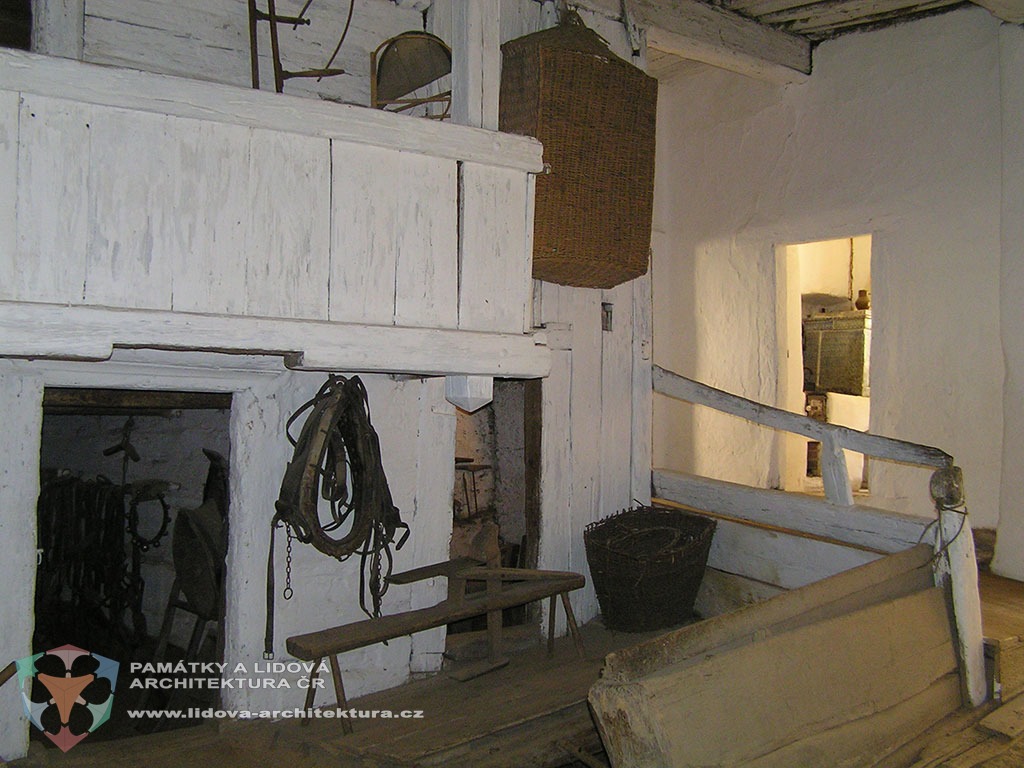 Granary house built of beams and stones